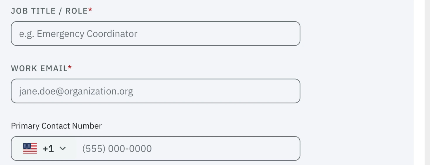 The redesigned form: job title, work e-mail, and a contact number field with a country flag and dial code selector built in